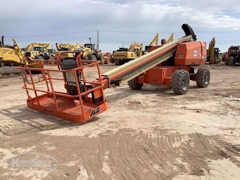 Used JLG Telescopic Boom Lift under blue sky for Sale