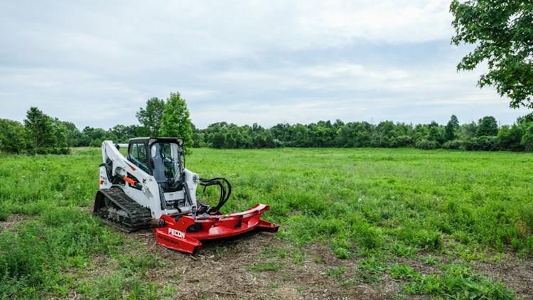 New Fecon Deck Mulcher working on a tree