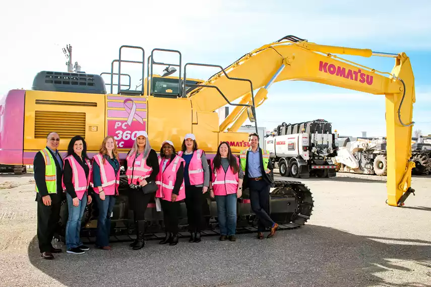 Breast-cancer awareness january 2024. Kirby-smith machinery supports breast cancer awareness organization, susan G komen. Pink excavator.