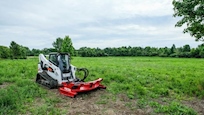 New Fecon Deck Mulcher working on a tree