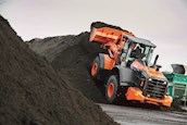 New Hitachi Loader dumping dirt