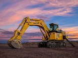 New Excavator Shovel under rising sun for Sale